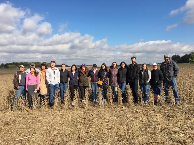 Ohio State students on the farm of Bret Davis as a part of the Future Eats program