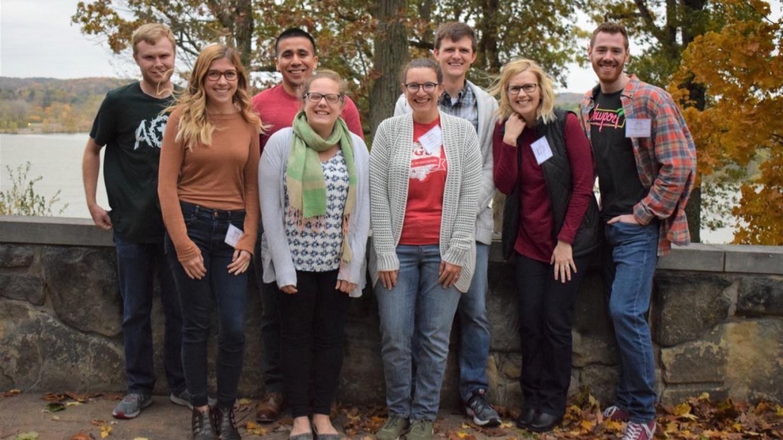 TPS Fellows standing together outside at Mohican Lodge